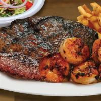 Surf & Turf · 6 oz. USDA Choice Cut Sirloin and 8 grilled or 5 fried shrimp. Served with a side salad and ...