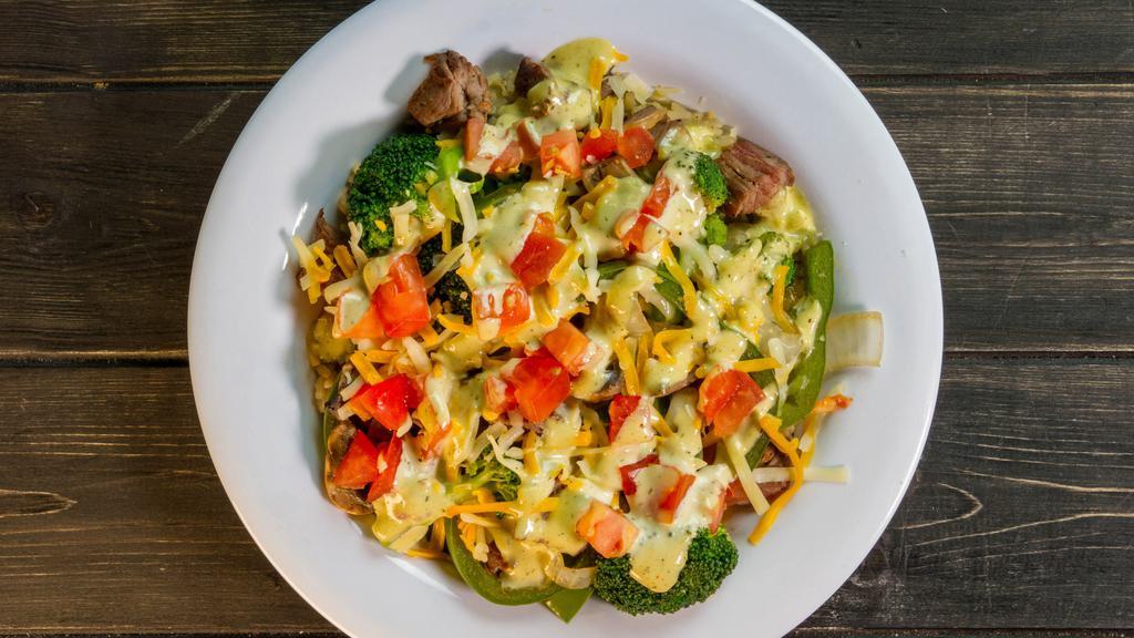 Steak Bowl · Grilled steak, peppers, onions,
mushrooms, broccoli and chopped
tomatoes over rice. Topped with
cheddar jack cheese and creamy
Poblano sauce.