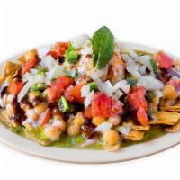 Papri Chaat · Fried dough wafers (papri chips) with diced onions, tomatoes, jalapeños mixed together with ...