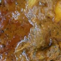 Lamb Vindaloo · Potatoes in a curry sauce. Served with basmati rice.