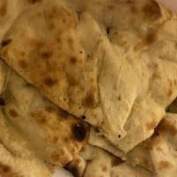 Classic Naan · Most popular. Unleavened tandoori baked bread.
