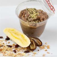 Sweet Treat Farro Porridge 9Oz · Farro, Almond Milk, Date, Banana, Sugar Cane, Almond, Guarana Powder, Goji.