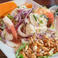 Ceviche Mixto · Fresh fish and seafood marinated in fresh lime juice with red onions, cilantro, peruvian cri...