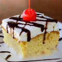 Tres Leches Cake · A semi sponge cake soaked in condensed, evaporated, and whole milk.