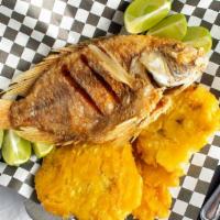 Mojarra Frita · Whole fried mojarra (fish).