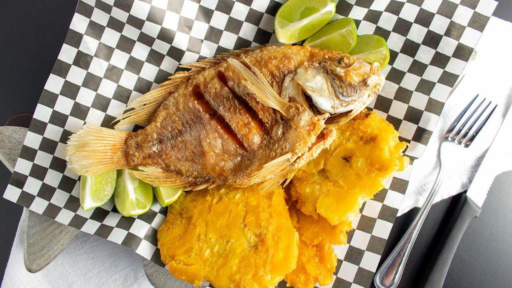 Mojarra Frita · Whole fried mojarra (fish).