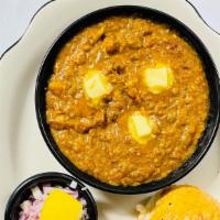 Pav Bhaji · Spicy. A spicy mashed vegetable dish, served piping hot with a dollop of butter, diced red o...