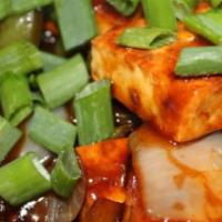 Paneer Chili · Fried paneer sautéed with garlic, ginger, bell pepper, chili and soy sauce.