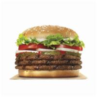 Triple Whopper® · Our Triple Whopper Sandwich includes three 1/4 lb* savory flame-grilled beef patties topped ...