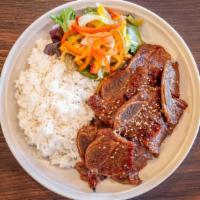 Kc Bbq Short Rib Premium · Char-grilled thin-sliced short ribs marinated in special KC BBQ sauce. Served with white or ...