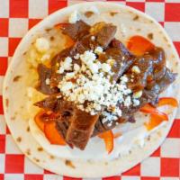 K Steak Taco · Grilled steak marinated in special KC BBQ sauce, sour cream, caramelized onion, pepper, cabb...