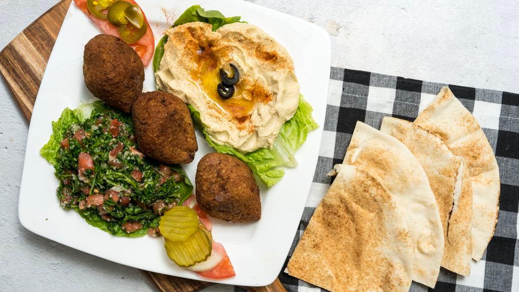 Kebbe Platter · Three kebabs  served with hummus, tabbouleh, tahini or tzatziki sauce and one pita bread. Add extra pita for an additional charge.