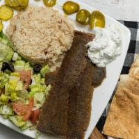 Gyros Platter · Served with rice, salad, tzatziki sauce and one pita bread. Add extra pita for an additional...