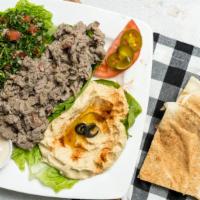 Shawarma Platter · Hummus, tabbouleh, pickles, tahini sauce and one pita bread. Add extra pita for an additiona...