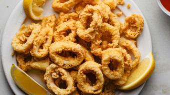 Fried Calamari · Lightly floured and seasoned with lemon, salt & pepper then fried to perfection served with ...