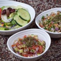 Tabouleh Salad · Vegetarian. Tomatoes, onions, parsley, and bulgur.