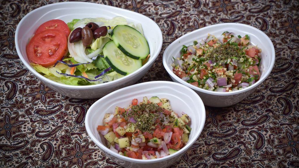 Shirazi Salad · Vegetarian. Diced tomatoes, cucumbers, and onions.