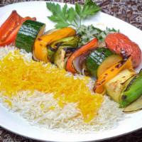 Vegetable Kabob · Vegetarian. Marinated eggplant, zucchini, onions, bell peppers, mushrooms and tomatoes.