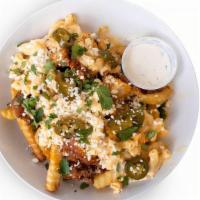 Buffalo Mac Attack · French Fries and your choice of protein tossed in a homemade buffalo sauce, mac & cheese, ja...