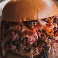 Pulled Pork Sandwich · Bone-in pork butt rubbed with our 4R All Purpose Rub and smoked for 12 hours until fork tend...
