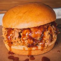 Pulled Chicken Sandwich · Seasoned with 4R All Purpose Rub,  smoked, chopped & tossed in 4R Signature Sauce.