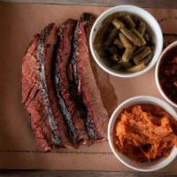 Signature Angus Brisket Platter · 30 day wet-aged beef brisket, rubbed with our 4R Brisket Rub and smoked for 18 hours. Hand s...
