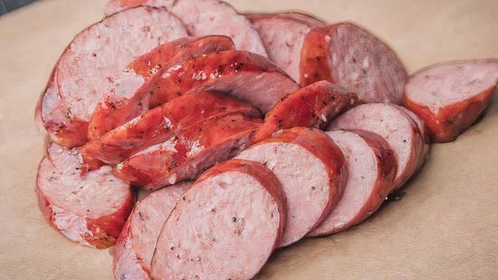 Texas Sausage Platter · Housemade from a family-owned company in Texas. Beef & pork sausage  smoked and packed full of flavor. Includes 3 sides and a choice of bread.