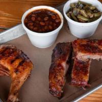 Chicken & Ribs Combo · 1/4 Smoked Chicken, 1/4 Rack of St. Louis Style Ribs and 2 sides.