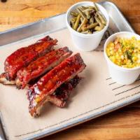 1/2 Rack Of St. Louis Style Ribs + 2 Sides · Seasoned with 4R All Purpose Rub,  smoked and finished with a Honey BBQ sauce. Comes with 2 ...