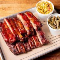 Full Rack Of St. Louis Style Ribs + 2 Sides · Seasoned with 4R All Purpose Rub, smoked and finished with a Honey BBQ sauce. Comes with 2 s...