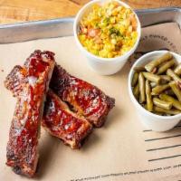 1/4 Rack Of St. Louis Style Ribs + 2 Sides · Seasoned with 4R All Purpose Rub,  smoked and finished with a Honey BBQ sauce. Comes with 2 ...