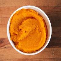 Sweet Potato Casserole  · Housemade smashed sweet potato puree with hints of butter, nutmeg, ginger and cinnamon.