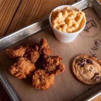 Kids Nuggets + 1 Side · includes 1 side, a drink and a cookie.