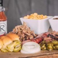 Large Party Pack · Comes with 2 pounds of Signature Angus Brisket, 2 pounds of Pulled Pork, 1 pound of Texas Sa...