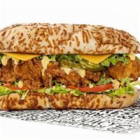 Oh Honey Sub · 2 crispy tenders, cheddar cheese, honey mustard, dill pickles, lettuce & tomato on an asiago...