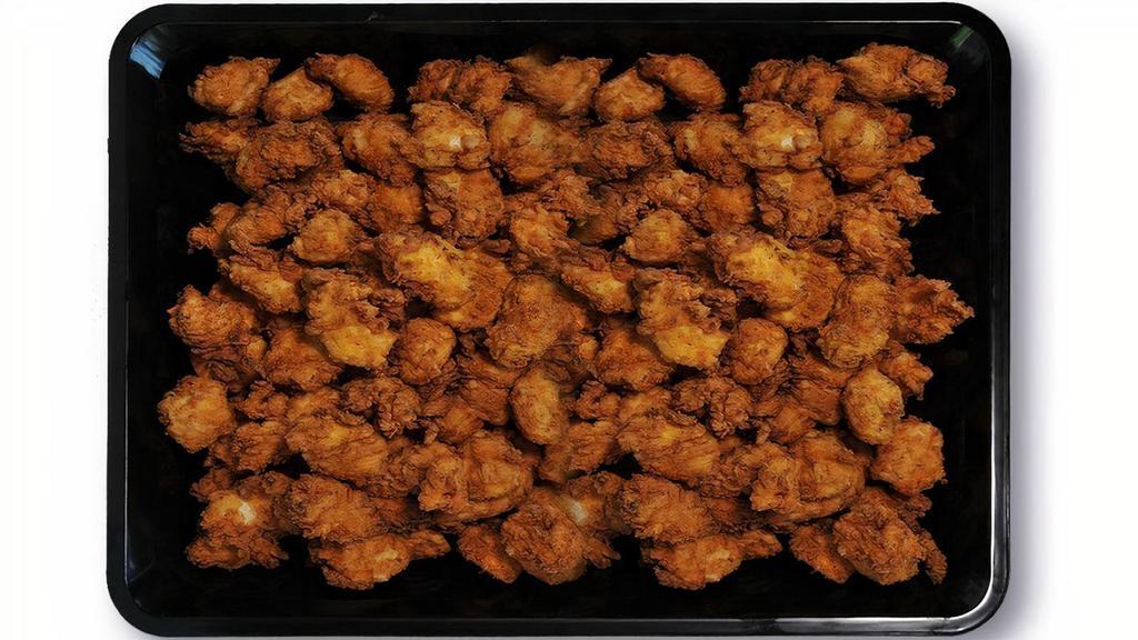 100 Crispy Nuggets · Crispy nuggets with choice of signature sauces.