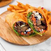 Gyro  Wrap · Lettuce, Tomatoes, Carrots, Red Cabbage, Cucumbers & Feta Cheese.
