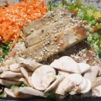 Asian Chicken Salad · Grilled Chicken, Lettuce, Mixed Peppers, Carrots & Mushrooms Topped with Sesame Seeds.