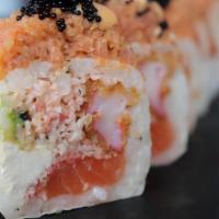 Osaka Roll · soy paper ,cream cheese,salmon,crab salad,avocado,crab tempura topped with spicy tuna and sp...
