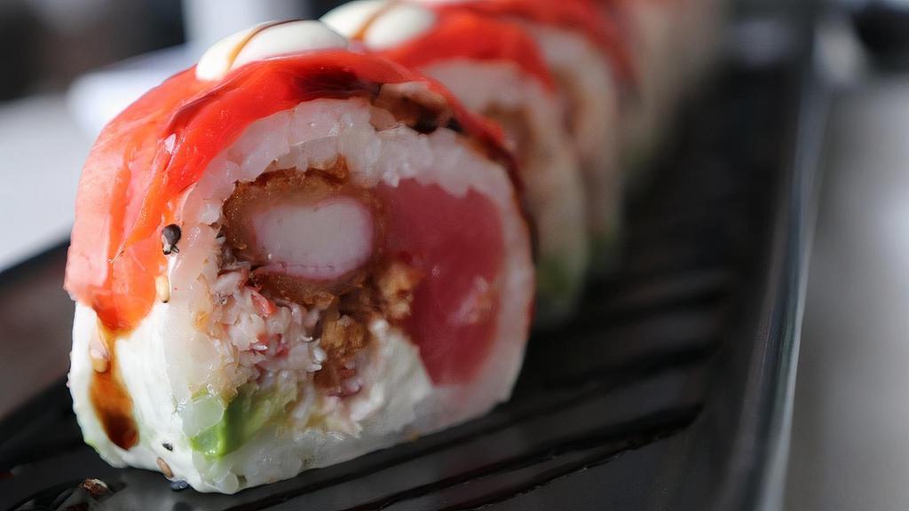 Sunset Roll(New) · SOY PAPER WITH REAL CRAB MEAT,CRAB TEMPURA, CREAM CHEESE, AVOCADO, TUNA, SHALLOTS, SMOKED SALMON ON TOP WITH TRUFFLE AIOLI AND BALSAMIC GLAZE.