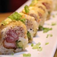 Laura Roll · soy paper , flakes, chives, tuna, cream cheese, krab salad, avocado, shallots,crab tempura a...