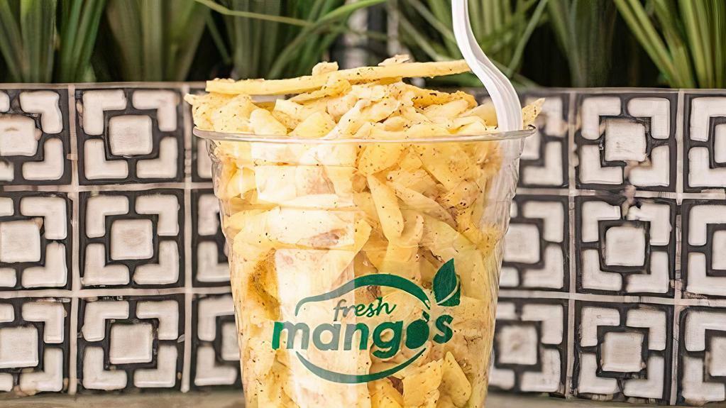 Classic Mango · Mango spiral, lime juice, salt, and pepper.