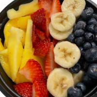 Fruit Bowl · 18oz. Mixed fresh fruit bowl: Mango, Banana, Strawberry, Blueberry, choose two toppiing!