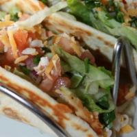 Chicken Tacos · Grilled Chicken, cabbage, pepper jack cheese, tomatoes, green onions, and poblano sauce