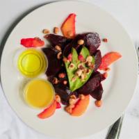 Beet Salad · Roasted red and golden beets, avocado, orange segments, toasted hazelnuts, and Citrus vinaig...