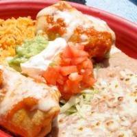 Chimichanga · Two deep-fried chimichangas, one filled with shredded chicken and one filled with shredded b...