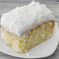 Coconut Cake · A divine blend if fresh coconut and spices. We top it off with a coconut buttercream icing.