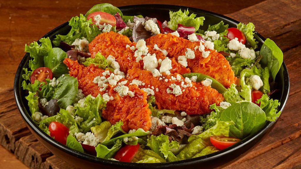 Buffalo Salad · Buffalo tenders, mixed greens, blue cheese crumbles, shredded carrots, grape tomatoes, and homemade Ranch.