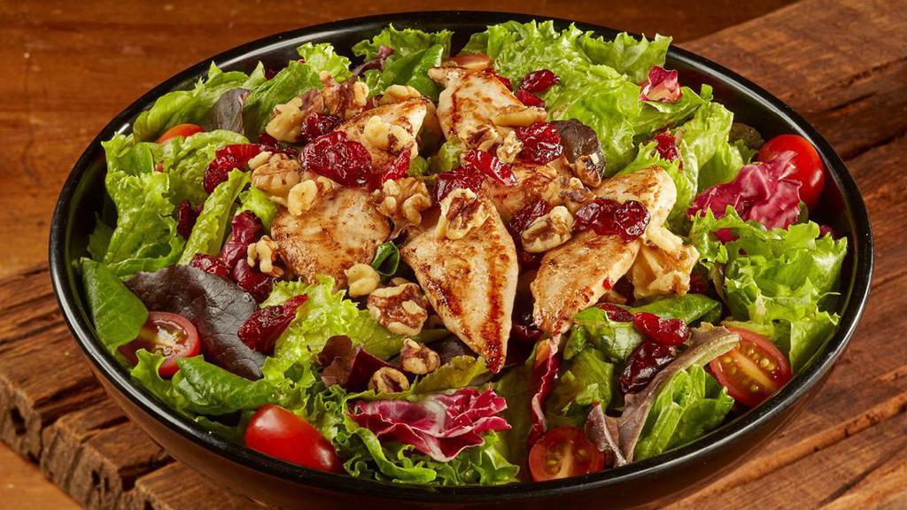 Magoo'S Favorite Salad · Tenders, mixed greens, dried cranberries, walnuts, grape tomatoes, and raspberry walnut vinaigrette.