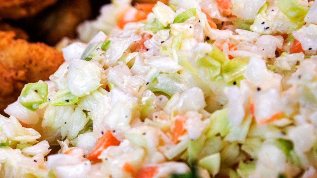 Cole Slaw, Regular · Diced cabbage and carrots in a light savory dressing. Made fresh daily.